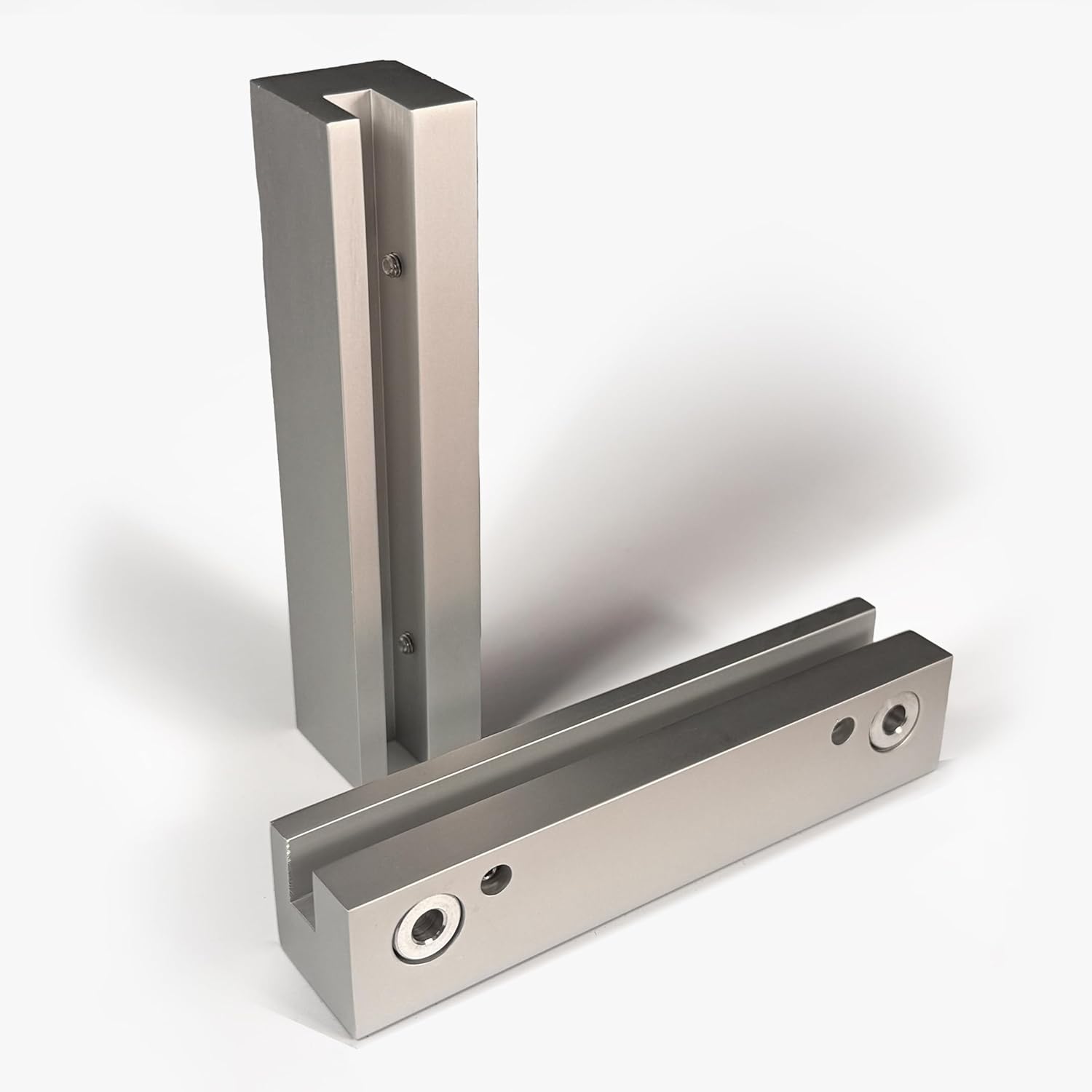 Corridor-mounted sign gripper displaying sleek aluminum construction for commercial environments